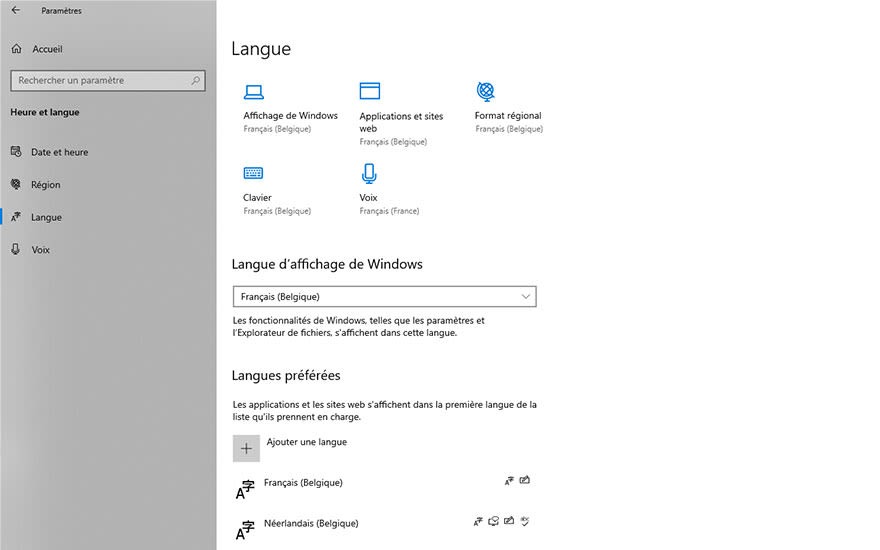 Paramètres de langue Windows affichant les options d'affichage, clavier et voix en français et néerlandais.