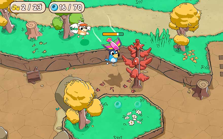 In a colourful forest game a small blue dog wearing a party hat explores autumn trees, with collected item icons shown at the top.