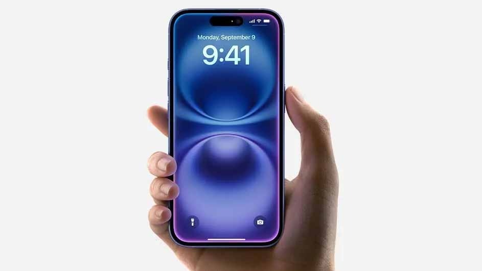 A hand holds an Apple iPhone with a purple display, slim bezels, and a Dynamic Island cut-out. The lock screen shows 9:41 on Monday, September 9.