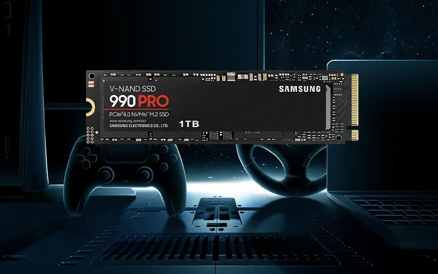 The Samsung 990 Pro SSD hovers above a gaming controller, a racing wheel and a laptop, against a futuristic blue background.