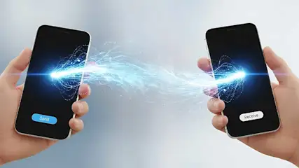 Deux smartphones se font face, reliés par un faisceau lumineux symbolisant un transfert de données, avec les boutons « Send » et « Receive ».