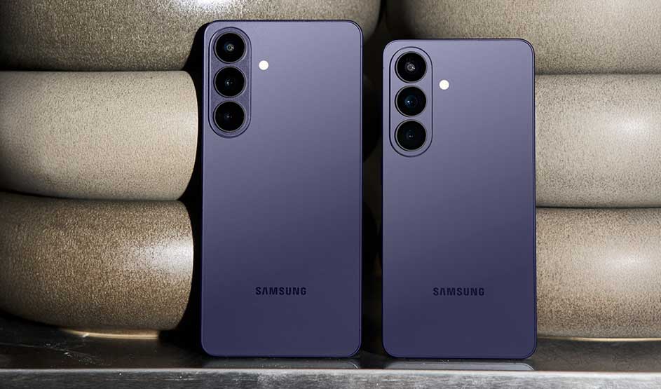 Two purple Samsung smartphones stand upright against rounded stone shapes in the background, drawing attention to their triple camera setup.