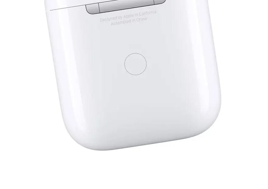 Boîtier blanc avec petit cercle et texte gris sur fond blanc.