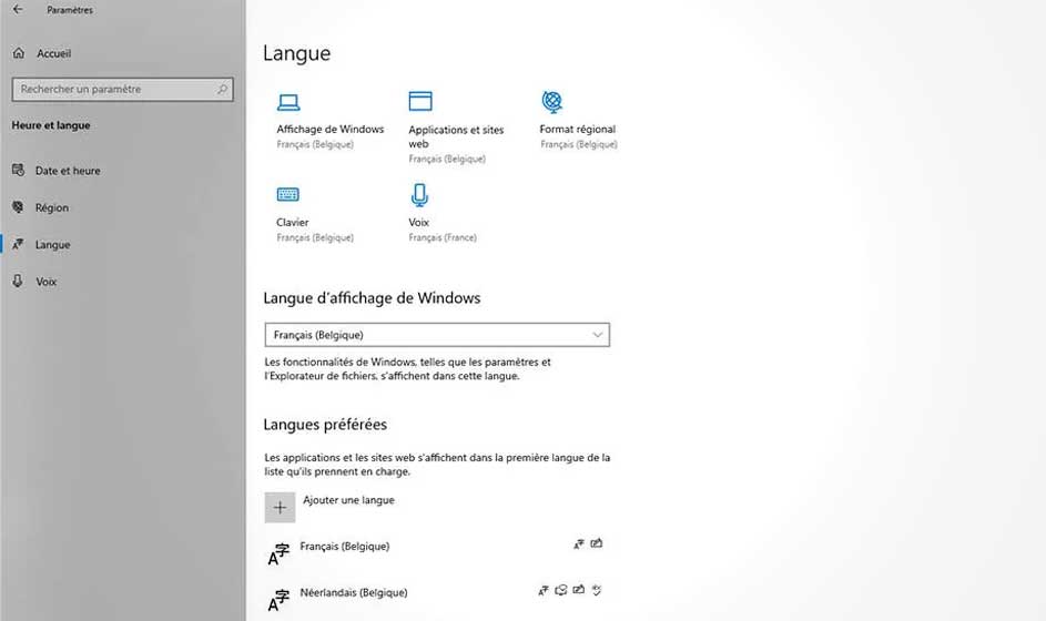 Paramètres de langue Windows affichant les options d'affichage, clavier et voix en français et néerlandais.