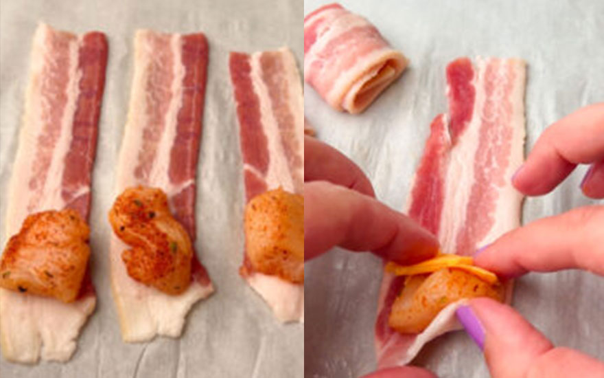 Sur une surface, du bacon cru avec des morceaux de poulet. Une main ajoute du fromage sur un morceau de poulet.