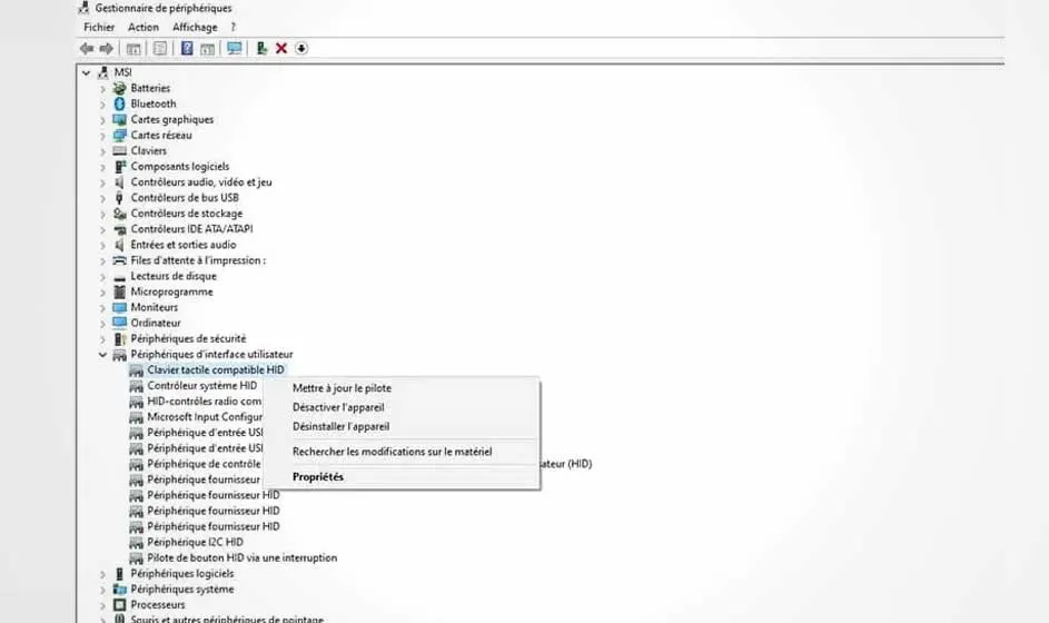 Gestionnaire de périphériques Windows affichant les options du pilote de clavier tactile HID. Menu contextuel "Propriétés" ouvert.