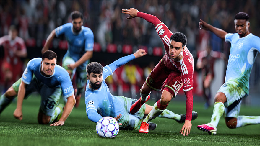 Des footballeurs en maillots rouges et bleu clair tombent au sol lors d’un duel intense pour le ballon.