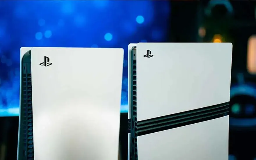 Two PlayStation 5 consoles are standing side by side against a blue background: one standard model and one with a black stripe.