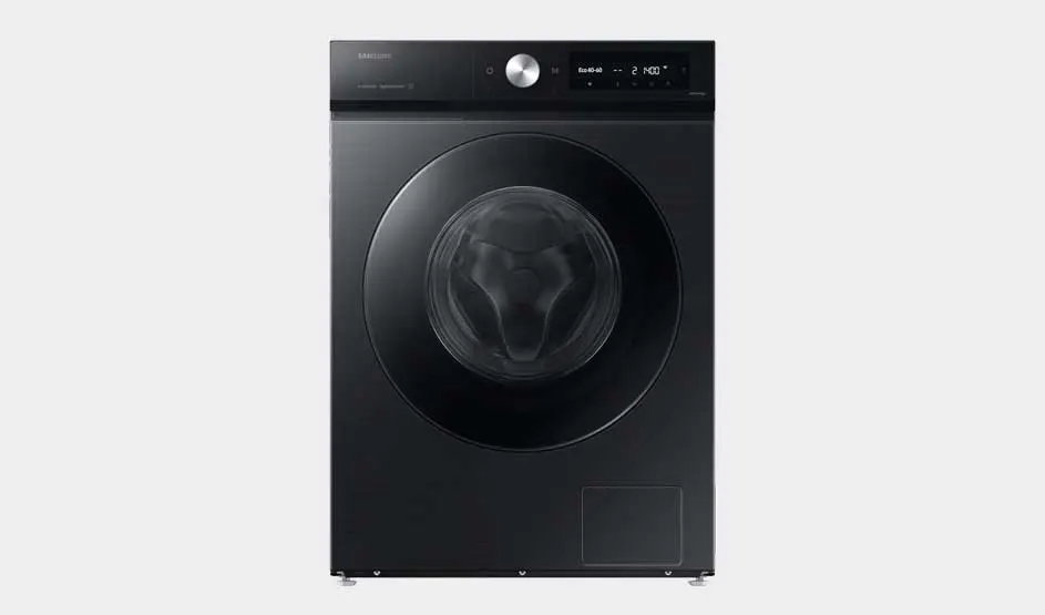 Black Samsung front-load washing machine with large circular door, slim top display and sleek minimalist styling set against a pale grey background.