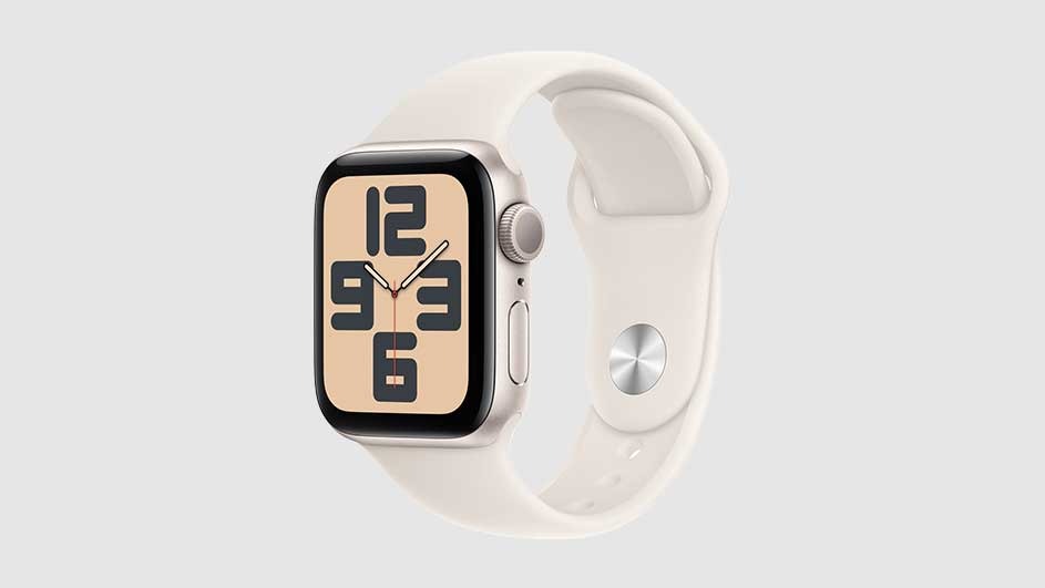 Beige smartwatch with a digital display showing 12, 3, 6, and 9. The watch has a matching band and a silver button.