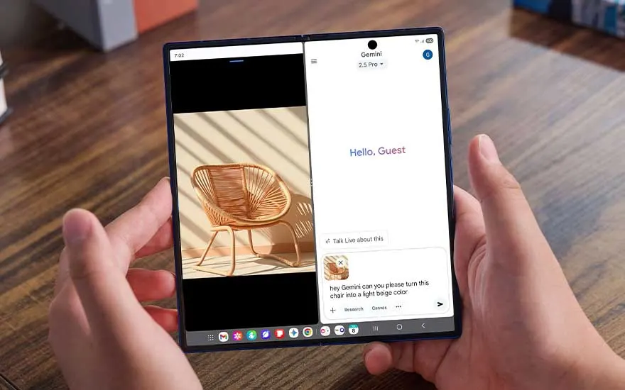 A Samsung foldable tablet is held in both hands, showing two apps side by side, including Gemini and an image of a chair.