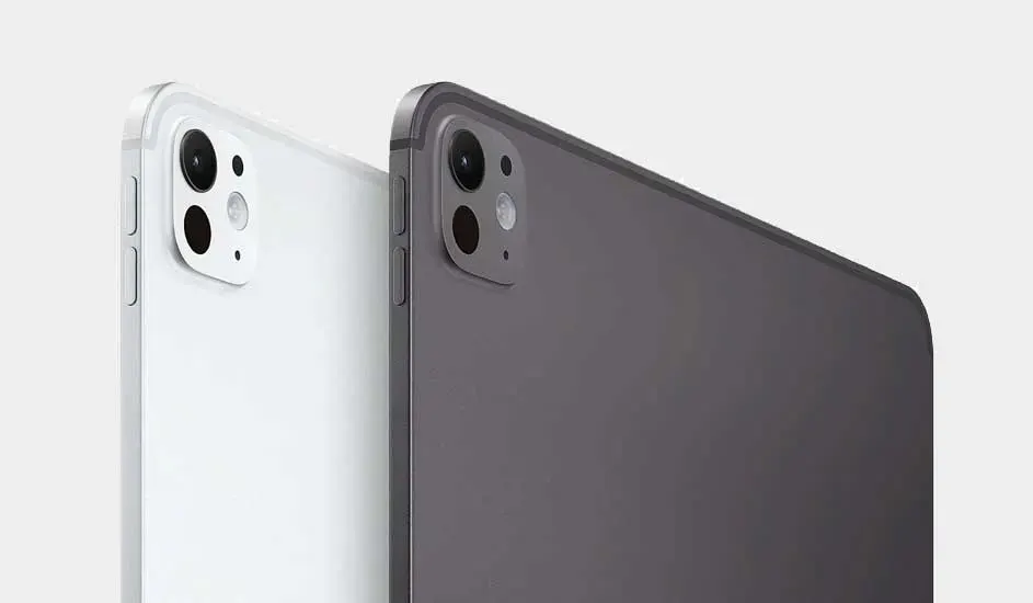 Two tablets, white and gray, stand side by side on a light gray background. Both have camera lenses visible on the top left.
