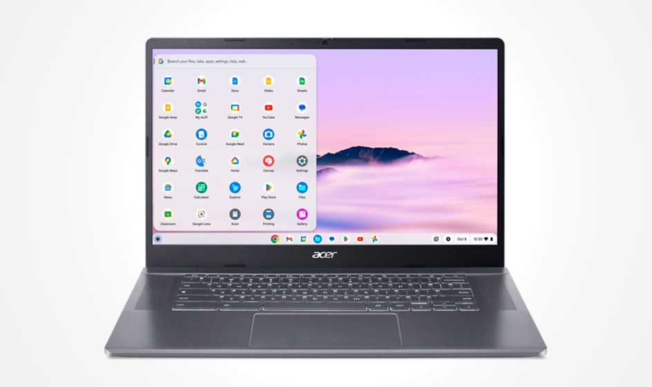 Un ordinateur portable Acer gris affiche un bureau lumineux, avec un menu d’apps à gauche et un paysage rose à l’écran.