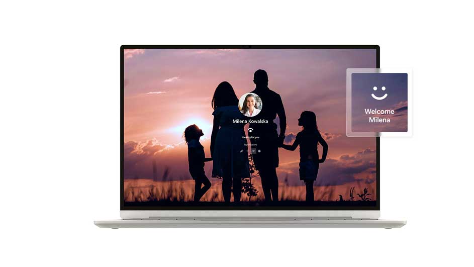 Ordinateur portable affichant un écran de connexion avec une photo de famille au coucher du soleil et un message de bienvenue pour Milena.