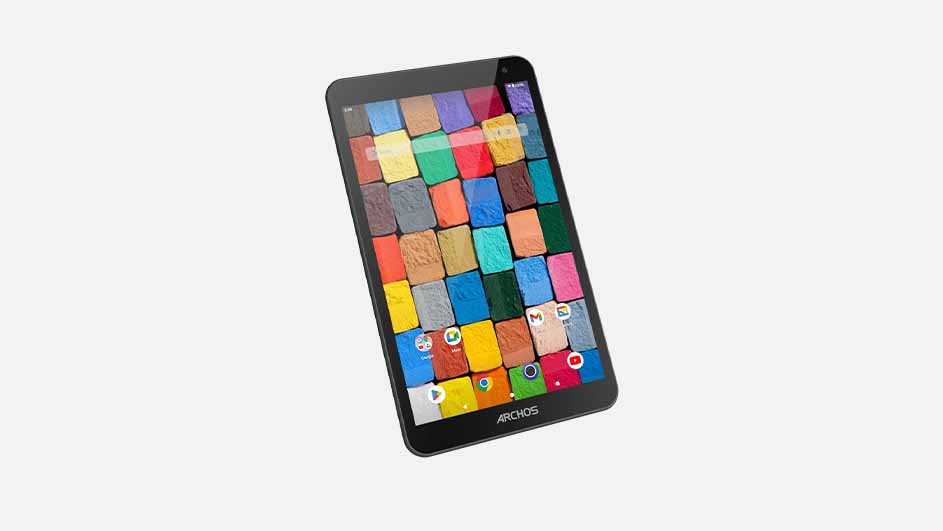 A black Archos tablet is angled against a plain white background. The screen displays a colorful mosaic pattern and app icons.
