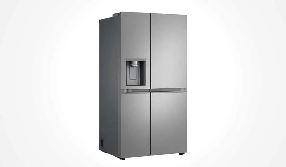  Large silver refrigerator with four doors and water dispenser. Modern, sleek design that combines functionality and elegance.