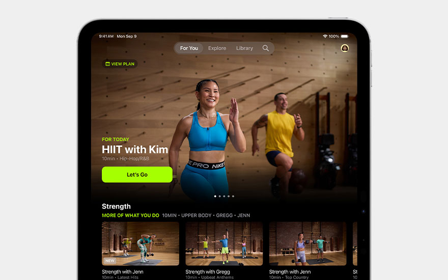 Fitness application showcasing HIIT workout with Kim. Strength exercises and workout options for various trainers and intensity levels.