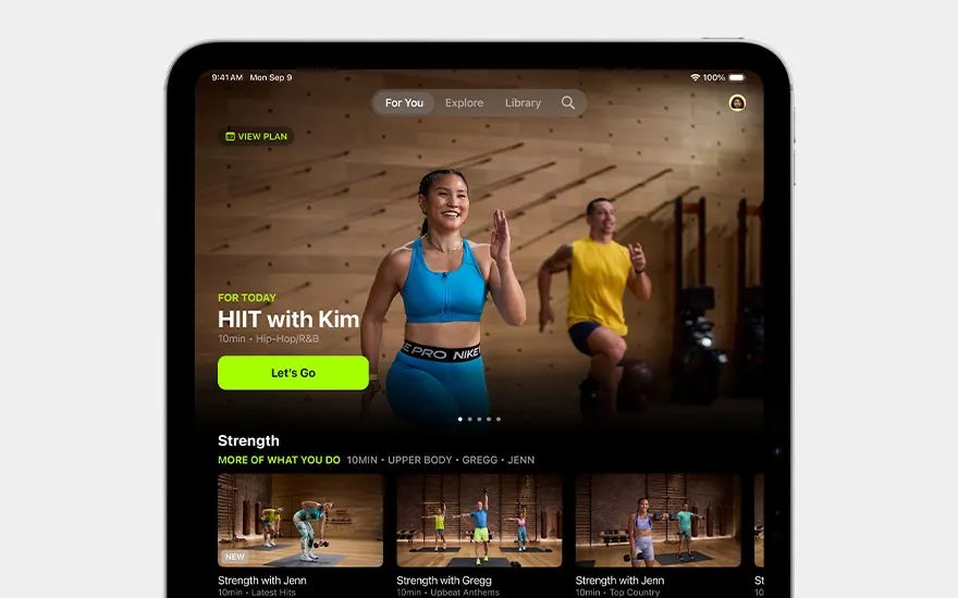 Fitness application showcasing HIIT workout with Kim. Strength exercises and workout options for various trainers and intensity levels.