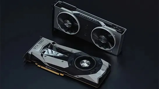 Two powerful graphics cards rest on a dark surface, sleek metal coolers and fans hinting at serious gaming performance.