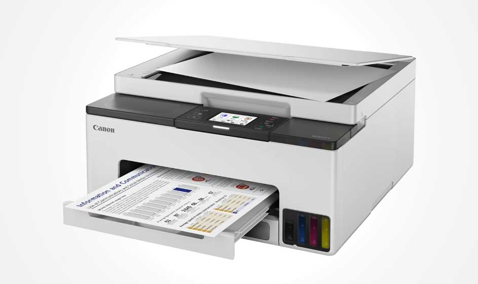 A white Canon printer with an open scanner is printing a colorful document. Four visible ink tanks appear below, set against a clean white background.