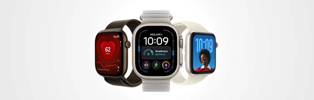 Trois montres connectées modernes sont présentées ensemble : un modèle sombre avec bracelet sportif, une montre argentée affichant des données de santé et un modèle clair avec portrait.