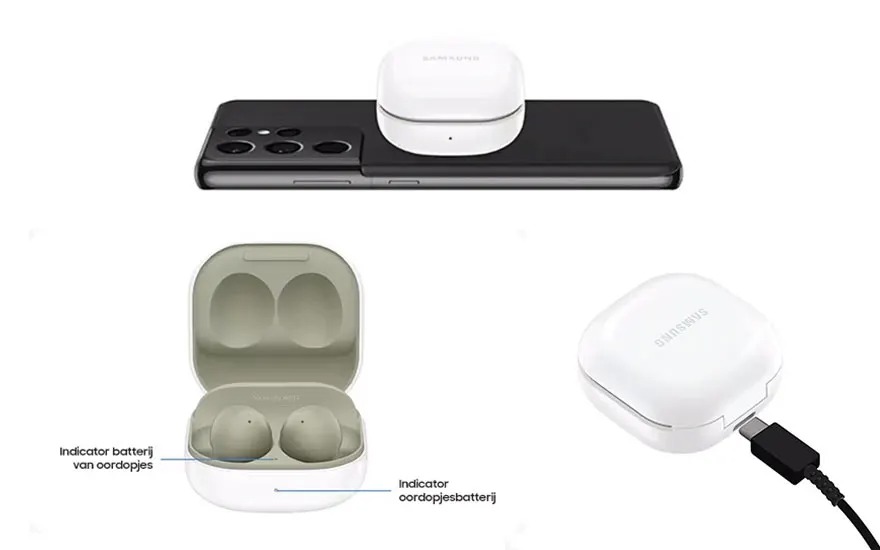 Een zwarte smartphone met witte oordopjes en een oplaadstation op een witte achtergrond.