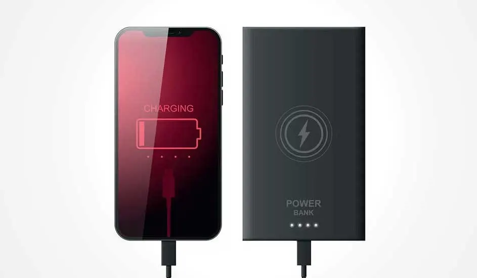 Un téléphone rouge en charge, connecté à une batterie externe grise avec un câble noir sur un fond blanc.