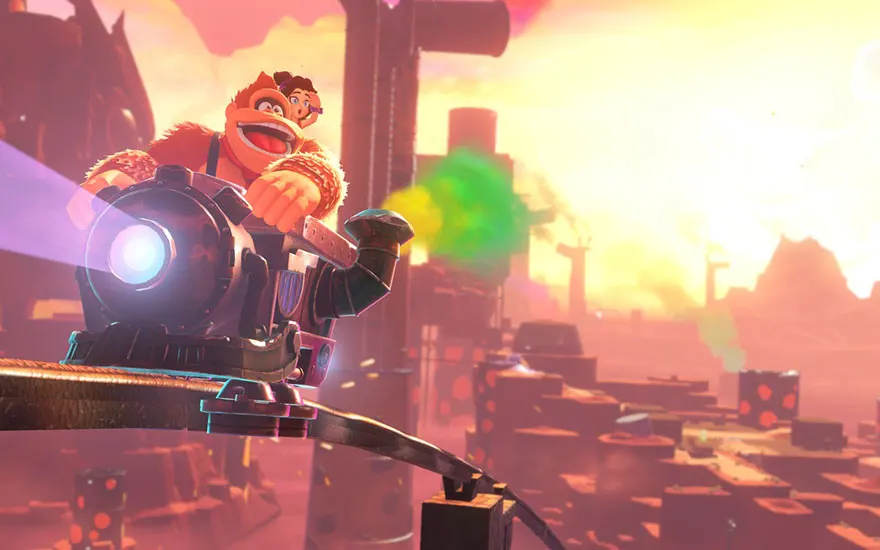 Donkey Kong et Pauline voyagent ensemble sur une locomotive à vapeur à travers une ville industrielle au coucher du soleil aux teintes chaudes.