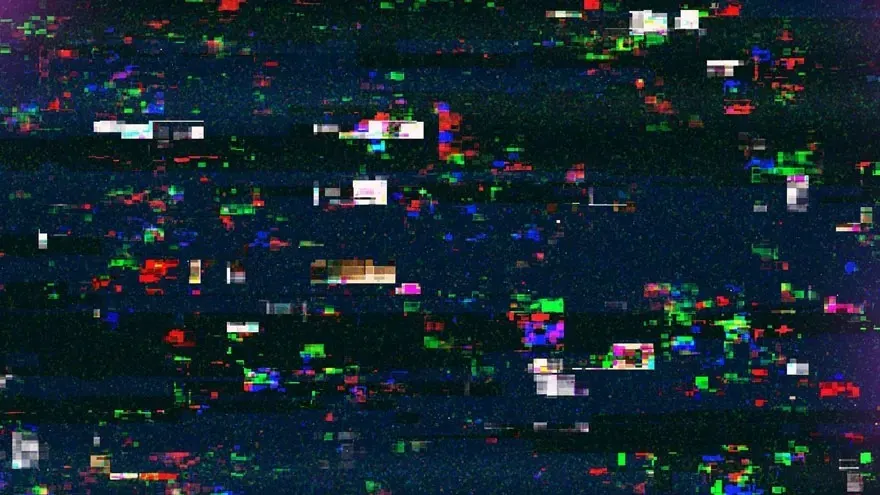 Abstract dark background with digital noise. Small squares of white, red, green and blue are scattered across it.