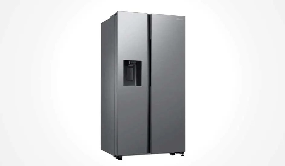 Modern silver refrigerator with double doors and water dispenser. Sleek design, perfect for large households and modern kitchens.