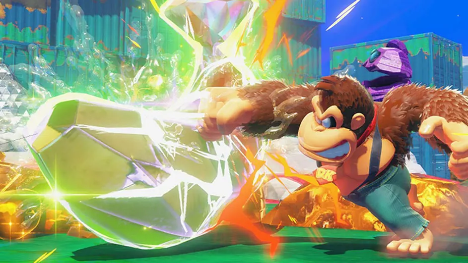 Un jeu vidéo montre un personnage frappant un objet vert, avec un fond bleu et vert.