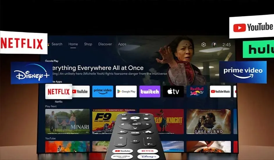 On a smart TV screen, popular apps like Netflix, Disney+, Prime Video, YouTube, Hulu and Google Play are shown with movie suggestions. A remote points at the TV interface displaying several streaming services. No brand is clearly visible.