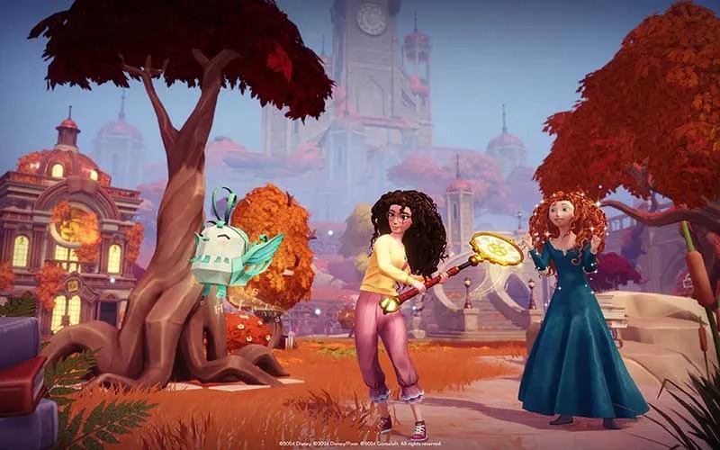 Two curly‑haired heroines stand in a magical autumn park, one wielding a glowing golden staff beside a floating creature and tall towers.