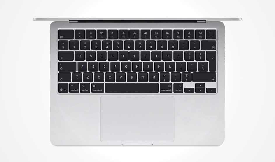 Top-down view of a sleek silver laptop with black chiclet keys and a large trackpad; minimalist design, no visible logo or branding shown.