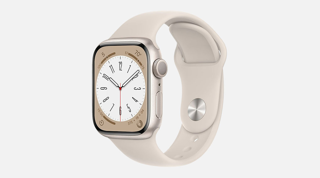 Montre connectée argentée avec un bracelet beige, affichant un cadran blanc avec des aiguilles noires.