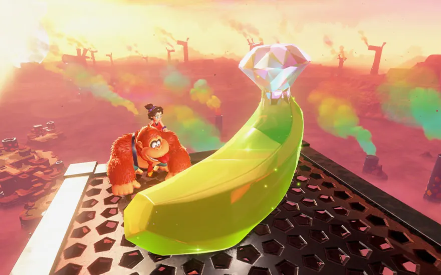Donkey Kong et Pauline voyagent dans une banane géante verte à travers un paysage coloré aux teintes roses et dorées au coucher du soleil.