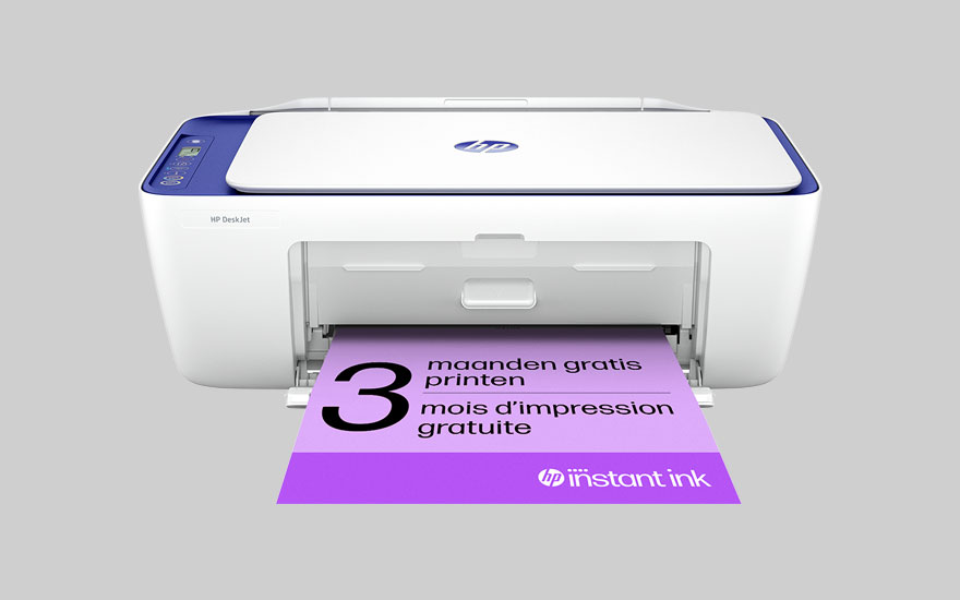 Imprimante blanche et bleue avec papier violet. Le papier indique "3 maanden gratis printen / mois d'impression gratuite".