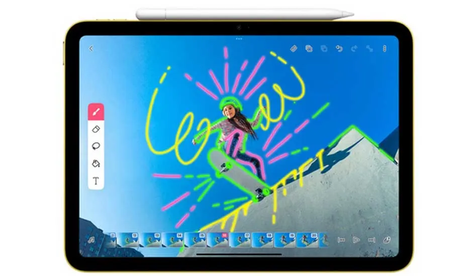 Een gouden tablet met een blauw scherm waarop een foto van een snowboarder is bewerkt met gekleurde lijnen.