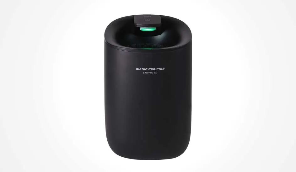 Un purificateur d’air noir Bionic Purifier ENVIO D3 aux coins arrondis, voyant vert sur le dessus et design moderne et compact.