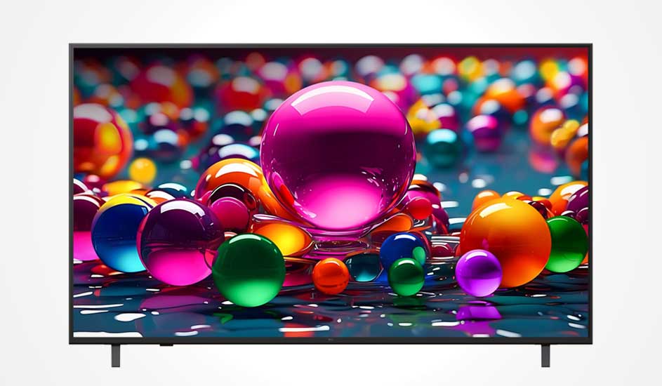 Une télévision à cadre noir fin posée sur deux larges pieds affiche un motif abstrait de sphères colorées à l’écran.