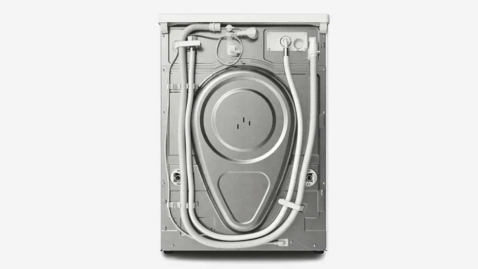 Vue arrière d'une machine à laver grise avec des tuyaux blancs.