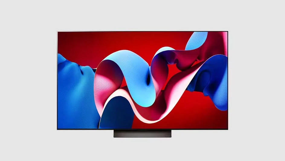 Un écran de télévision affiche des rubans bleus et roses sur un fond rouge. L'écran est monté sur un support gris.