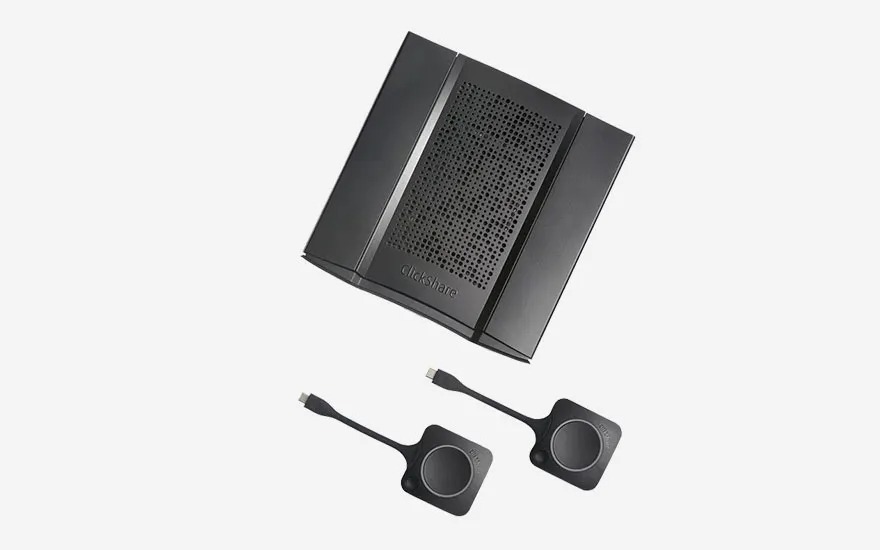 Two ClickShare USB-C buttons and a ClickShare base unit are placed on a light background, ready for seamless meeting use.