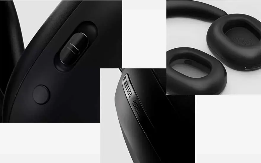 Gros plan d'un casque noir avec boutons, curseurs et coussinets d'oreille sur fond blanc.