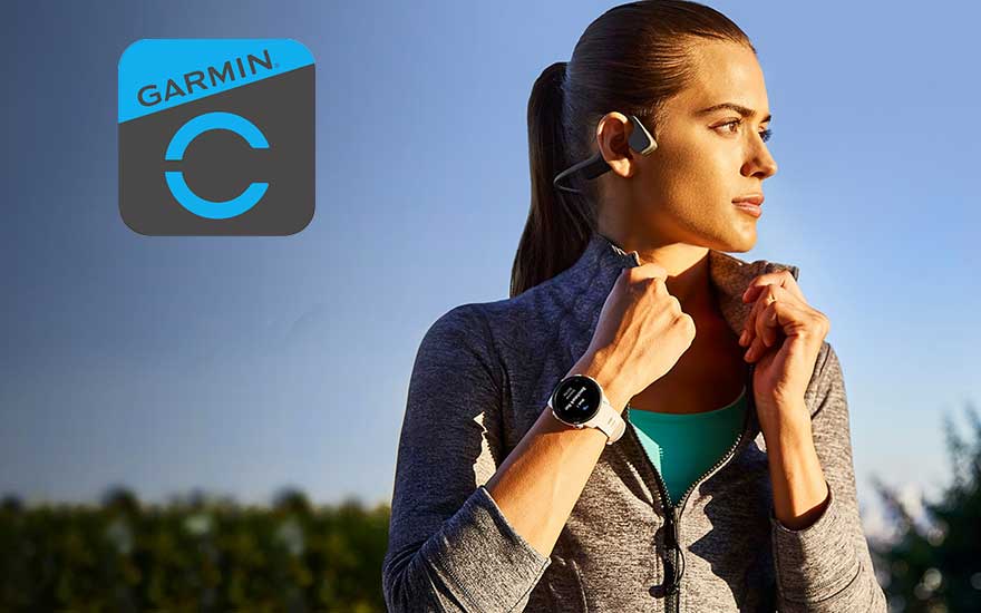 Logo Garmin bleu et gris. Une montre blanche est port ée, des écouteurs sont sur les oreilles et un ciel bleu en arrière-plan.