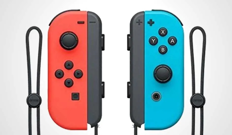 Two Nintendo Switch Joy-Cons, one red, one blue, both with black buttons and wrist straps on a white background.