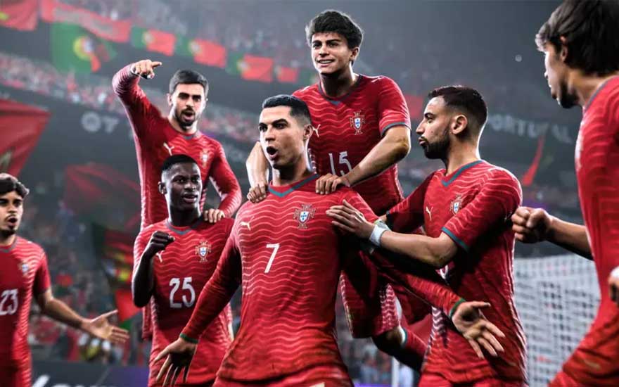 Portugese voetballers in rode shirts vieren uitbundig een doelpunt op het veld, omringd door supporters en vlaggen in het stadion.