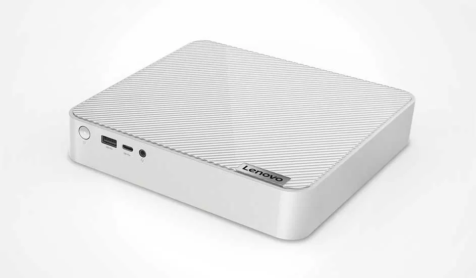 Een compacte, witte Lenovo mini-pc met een geribbelde bovenkant en verschillende poorten aan de voorkant.