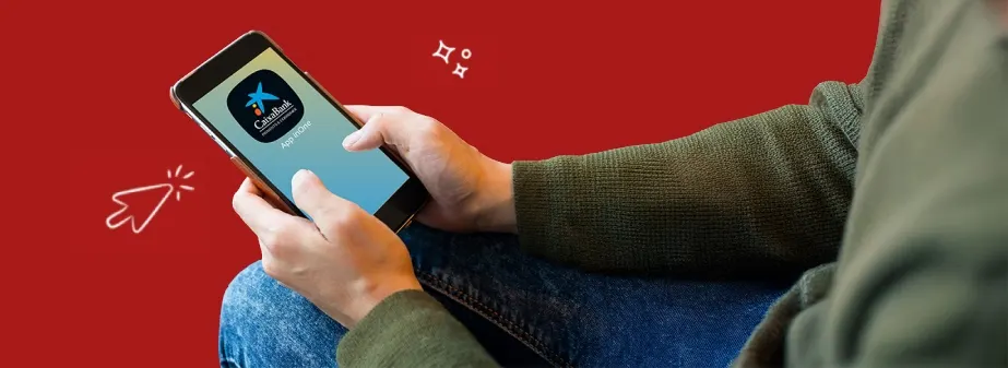 Persona usa móvil con app bancaria. Fondo rojo con gráficos de cursor y destellos. Viste vaqueros y suéter verde.