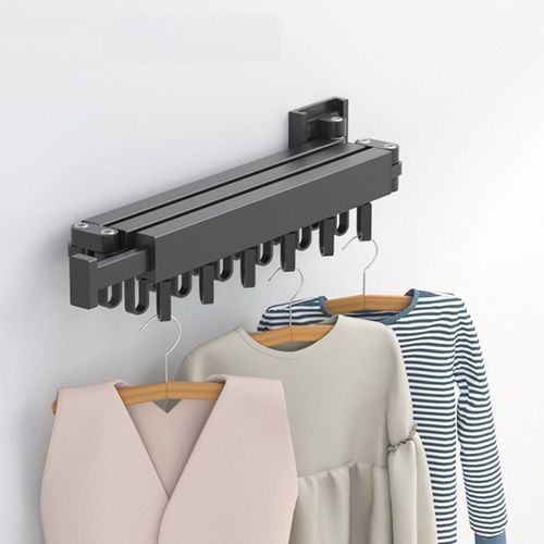 Imagen de un tendedero de brazo retráctil plegado